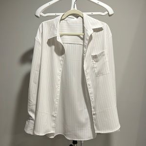 The Frankie shop Lui oversized pinstriped crepe shirt.